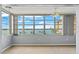 Sunroom with stunning water views and tiled floor at 5108 Brittany S Dr # 506, St Petersburg, FL 33715