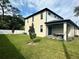Private backyard with covered patio and grassy lawn at 6524 6Th N Ave, St Petersburg, FL 33710