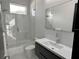Contemporary bathroom with walk in shower and floating vanity at 6524 6Th N Ave, St Petersburg, FL 33710
