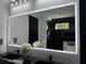 Modern bathroom with double vanity and large mirror at 6524 6Th N Ave, St Petersburg, FL 33710