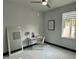 Bright bedroom with a desk, mirror, and window at 6524 6Th N Ave, St Petersburg, FL 33710