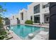 Beautiful pool area, modern architectural details, and inviting lounge space at 7602 Antilla St, Tampa, FL 33625