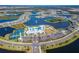 Aerial view of community amenities including pool, tennis courts, and clubhouse at 8705 Coastal Key Way, Parrish, FL 34219