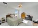 Bedroom with a queen bed and neutral decor at 8705 Coastal Key Way, Parrish, FL 34219