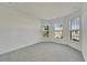 Bright bedroom with bay windows and neutral carpeting at 8705 Coastal Key Way, Parrish, FL 34219