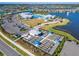 Community garden with various plots and a small building at 8705 Coastal Key Way, Parrish, FL 34219