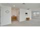 Loft area with wood dresser and TV mount at 8705 Coastal Key Way, Parrish, FL 34219