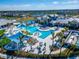 Resort-style pool with lap lanes, a spa, and plenty of lounge chairs at 8705 Coastal Key Way, Parrish, FL 34219