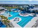 Large community pool with lap lanes and plenty of lounge chairs at 8705 Coastal Key Way, Parrish, FL 34219