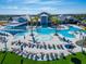 Relaxing pool area with lounge chairs and umbrellas at 8705 Coastal Key Way, Parrish, FL 34219