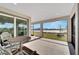 Spacious screened patio overlooking a tranquil pond view at 8705 Coastal Key Way, Parrish, FL 34219