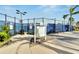 Well maintained tennis courts with clear signage at 8705 Coastal Key Way, Parrish, FL 34219