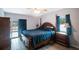 Spacious bedroom with a king-size bed and ample natural light at 1009 Black Knight Dr, Valrico, FL 33594