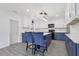 Beautiful kitchen featuring quartz counters, a farmhouse sink, and modern appliances at 1009 Black Knight Dr, Valrico, FL 33594