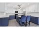 Modern kitchen design with white subway tile backsplash and an island with breakfast bar at 1009 Black Knight Dr, Valrico, FL 33594