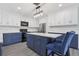 Modern kitchen design with a breakfast bar island and stainless steel appliances at 1009 Black Knight Dr, Valrico, FL 33594