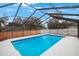 Inviting screened pool with ample deck space at 1009 Black Knight Dr, Valrico, FL 33594