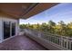 Private balcony overlooking lush trees and landscape at 12077 Gandy N Blvd # 332, St Petersburg, FL 33702