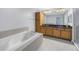 Bathroom vanity with tub and shower at 12077 Gandy N Blvd # 332, St Petersburg, FL 33702