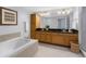 Bathroom with vanity, tub, and shower at 12077 Gandy N Blvd # 332, St Petersburg, FL 33702