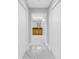 Bathroom view through the hallway at 12077 Gandy N Blvd # 332, St Petersburg, FL 33702