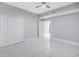 Bright bedroom with double doors and marble floors at 12077 Gandy N Blvd # 332, St Petersburg, FL 33702