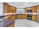 Well-equipped kitchen with stainless steel appliances, granite countertops, and ample cabinet space at 12077 Gandy N Blvd # 332, St Petersburg, FL 33702