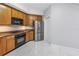 Bright kitchen area with stainless steel appliances and an abundance of cabinetry at 12077 Gandy N Blvd # 332, St Petersburg, FL 33702