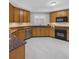 Cozy kitchen with ample counter space, stainless steel appliances, and plentiful cabinets at 12077 Gandy N Blvd # 332, St Petersburg, FL 33702