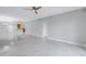 Open concept living area with marble floors and kitchen view at 12077 Gandy N Blvd # 332, St Petersburg, FL 33702