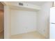 Compact dining space with a blank wall and tile floor at 12119 Sunny Glen Ln # F1, Hudson, FL 34669