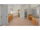 Large bathroom with double vanity, soaking tub, and shower at 1406 Deerbourne Dr, Wesley Chapel, FL 33543