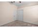 Bedroom with neutral walls, ceiling fan, and double door closet at 1406 Deerbourne Dr, Wesley Chapel, FL 33543