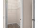 Walk-in closet with wire shelving for convenient storage at 1406 Deerbourne Dr, Wesley Chapel, FL 33543