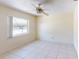 Bedroom with tile flooring and a window with natural light at 16201 Gulf Blvd, Redington Beach, FL 33708