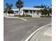 Street view showing a corner lot with a one-story house at 16201 Gulf Blvd, Redington Beach, FL 33708