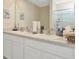 Bathroom with double vanity and a walk-in shower at 1663 Hazy Sea Dr, Plant City, FL 33565