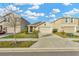 Two-story house with a two-car garage and front yard at 1663 Hazy Sea Dr, Plant City, FL 33565