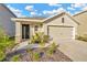 Attractive one-story home with a two-car garage and landscaped front yard at 1663 Hazy Sea Dr, Plant City, FL 33565