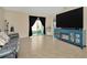 Living room with fireplace and access to backyard at 1663 Hazy Sea Dr, Plant City, FL 33565