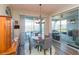 Charming dining room with lake views and access to outdoor patio at 19494 Sea Glass Cir, Land O Lakes, FL 34638
