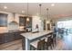 Modern kitchen with granite countertops and stainless steel appliances at 19494 Sea Glass Cir, Land O Lakes, FL 34638