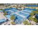 Multiple pickleball courts with surrounding fencing and shade at 19494 Sea Glass Cir, Land O Lakes, FL 34638
