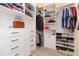 Large walk-in closet featuring shelves and hanging space at 19494 Sea Glass Cir, Land O Lakes, FL 34638