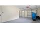 Two-car garage with automatic openers and extra storage at 2464 Keeport Dr, Spring Hill, FL 34609