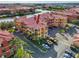 Aerial view of condo building showcasing the property's location and surrounding area at 2733 Via Cipriani # 830A, Clearwater, FL 33764