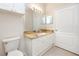 Bathroom with granite countertop and white cabinets at 2733 Via Cipriani # 830A, Clearwater, FL 33764