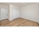 Bright bedroom with wood-look floors and double door closet at 2733 Via Cipriani # 830A, Clearwater, FL 33764