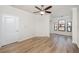 Spacious bedroom with hardwood floors and ceiling fan at 2733 Via Cipriani # 830A, Clearwater, FL 33764