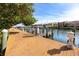 Community boardwalk with boat slips and water access at 2733 Via Cipriani # 830A, Clearwater, FL 33764